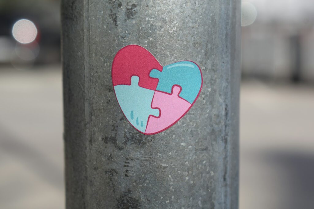 Autism sticker on an electrical pole